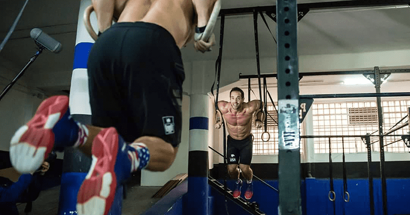 boxes in madrid Rich Froning and Dan Bailey ring muscle ups at crossfit bellum