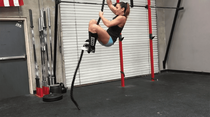 female crossfit athlete rope climb with fast J wrap