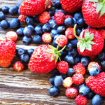 superfood berries blueberry strawberry on wood