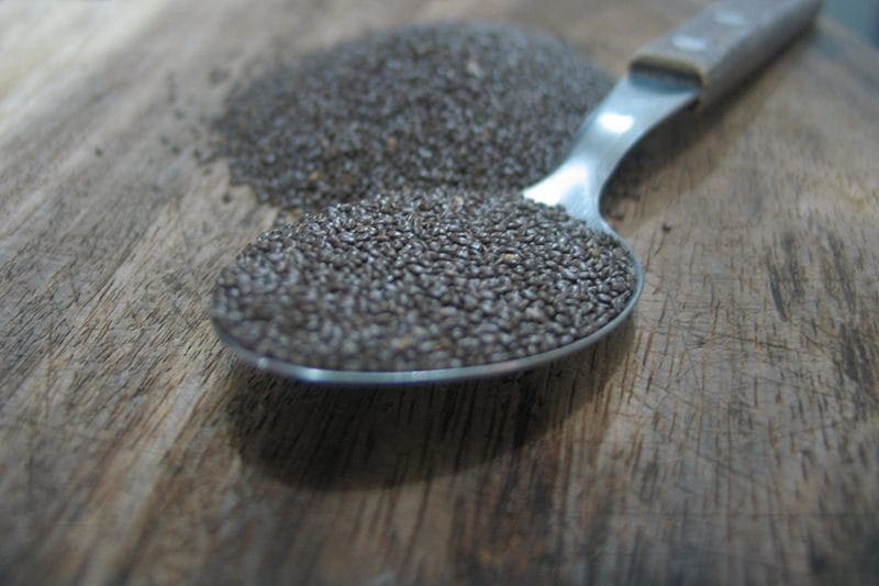 chia seeds on spoon eating right Low Fat Breakfast Foods