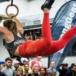 gymnastic wods female crossfitter ring muscle up eating right importance of recovery kipping