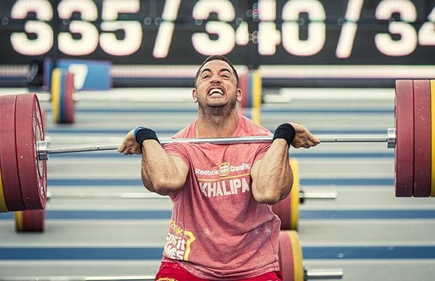 jason khalipa cleans weight at the CrossFit Games