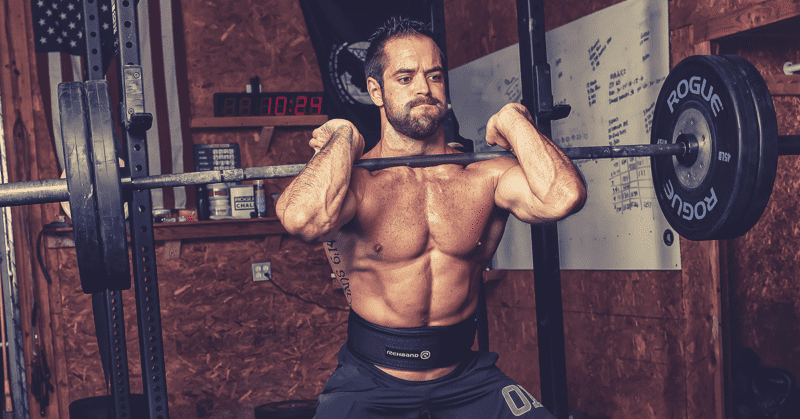 rich froning performs dead stop exercises with barbell