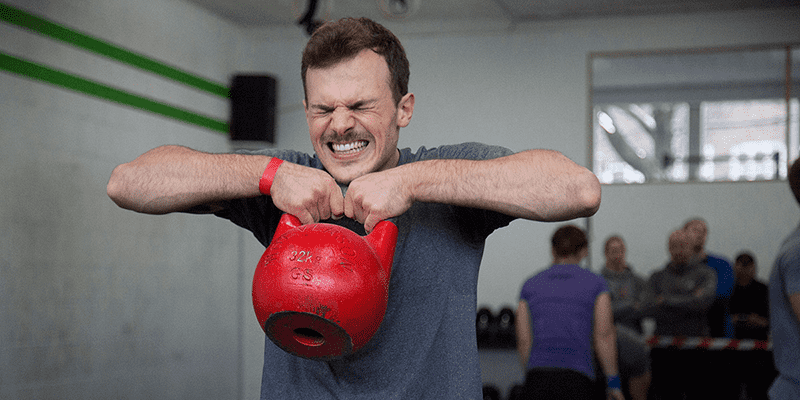 Beginners athlete with kettlebell