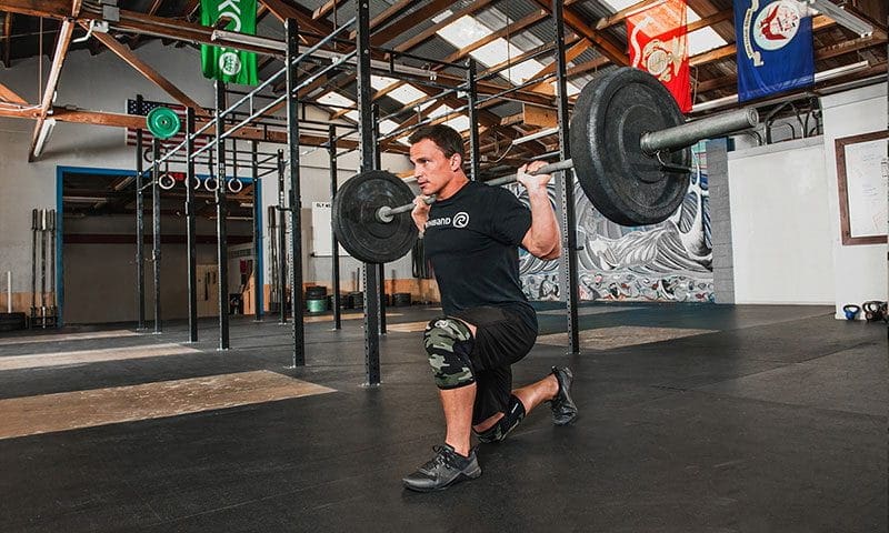 Crossfit games athlete Josh Bridges trains core strength with lunges