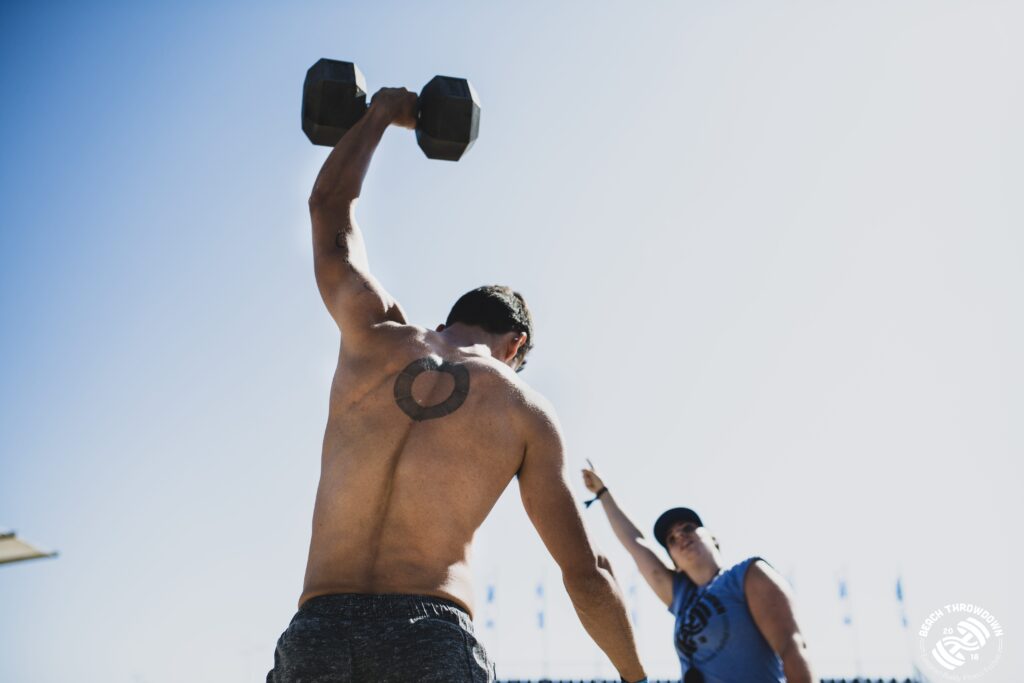 athlete dumbbell snatch