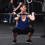athlete perfects her weightlifting skills with clean workouts Beginner Ab Exercises