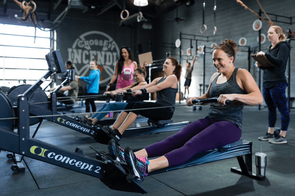 crossfit class doing rowing workouts