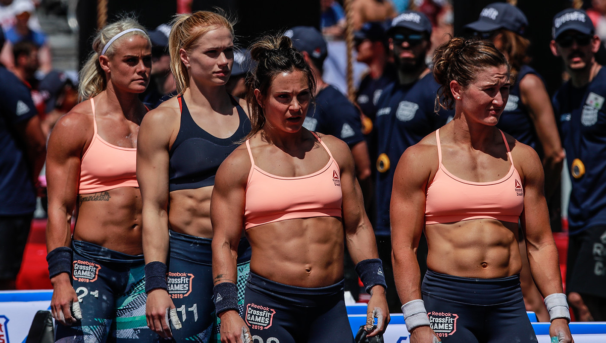 great athletes with six packs on show at the crossfit games