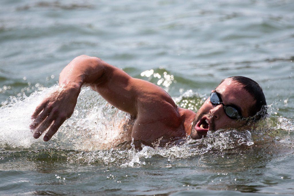 swimming in open water Why NOT Showering Cold is KILLING Your Gains