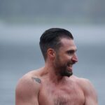 Man wild swimming