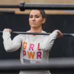 woman warm up with barbell