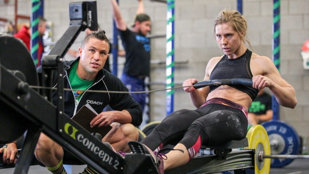 crossfit coach by rower