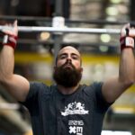 Protein for athlete with barbell