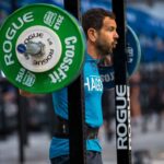 master athlete about to back squat Barbell Training for Muscle Growth