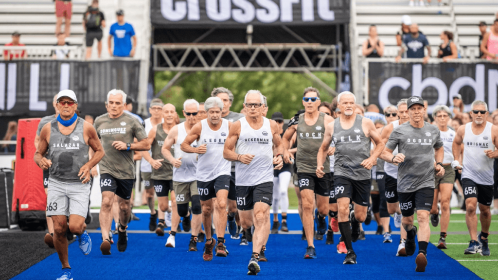 Masters athletes run during day 1 of the crossfit games