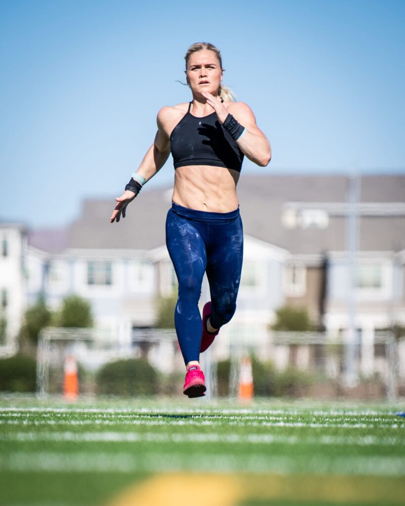 female runner sprints to build endurance