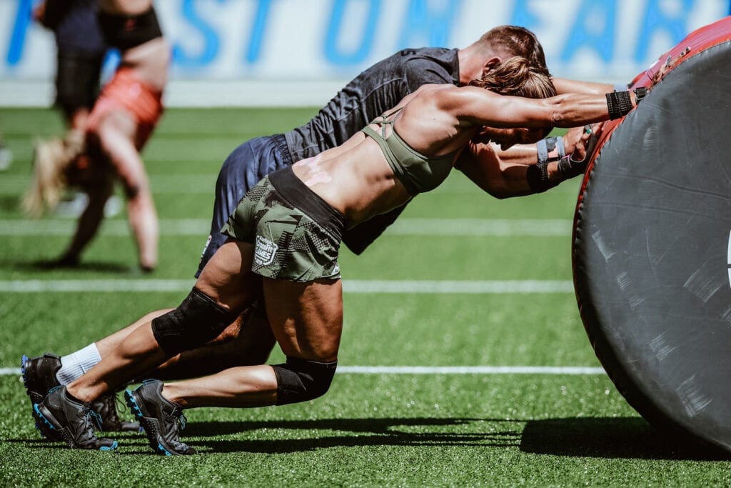 team at the crossfit games performs workout