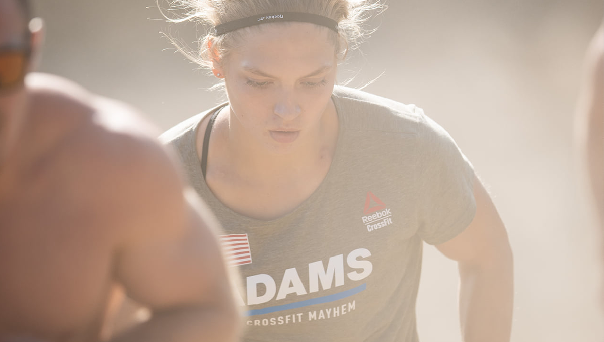 young athlete sprints up a hill