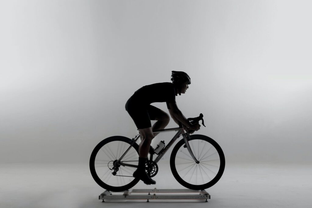 athlete does effective indoor static bike workouts