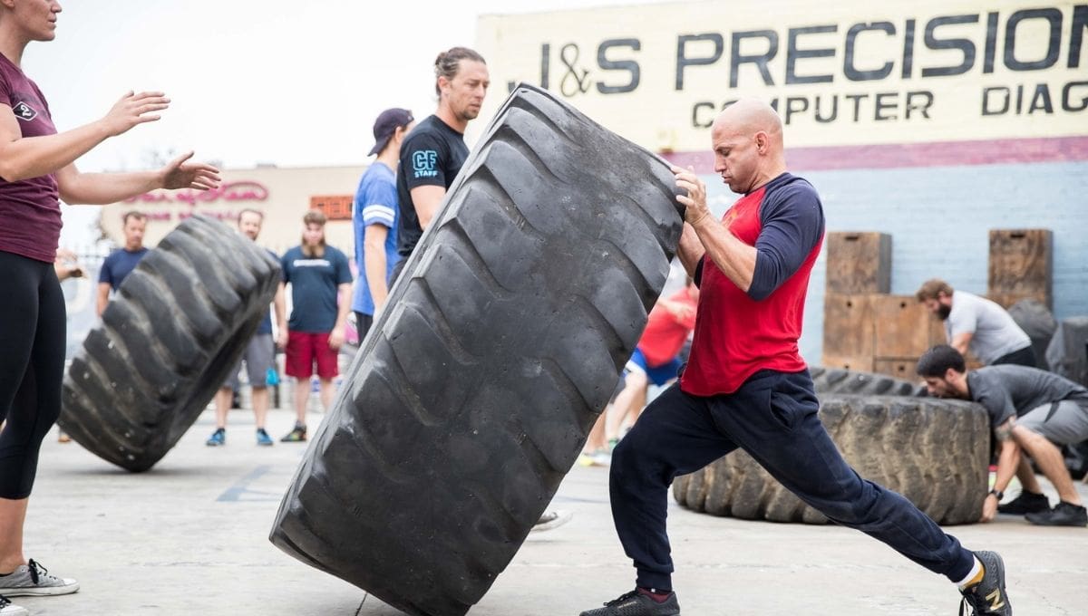 Odd Object Workouts for Athletes Yoke Carry Tire Flips Sandbag