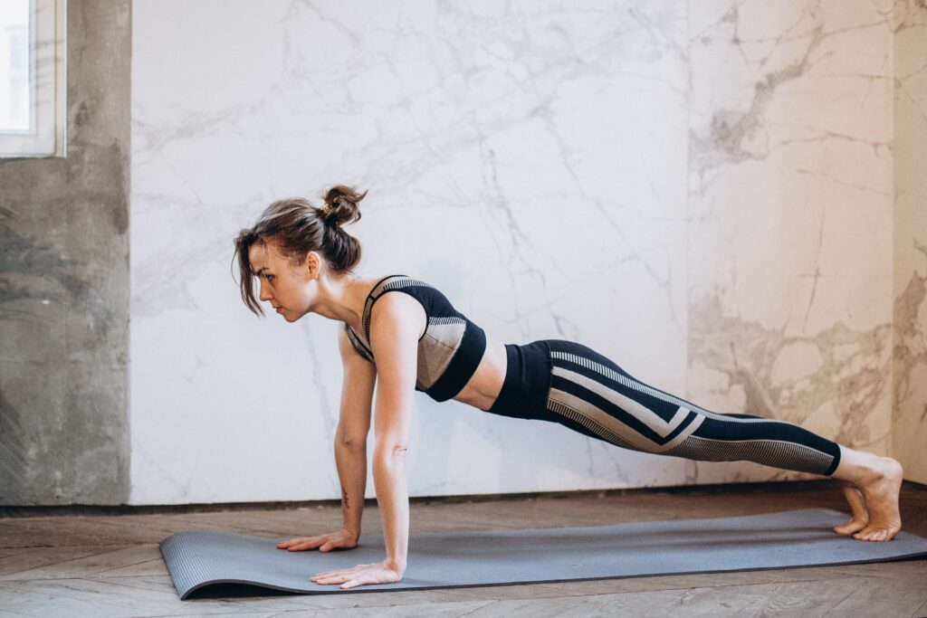 athlete completes bodyweight workout at home