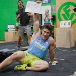 Justin Medeiros celebrates with coach Adam Neiffer in background