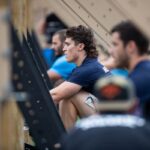 Justin Medeiros on rowing machine How to Do HIIT Cardio to Get to 10% Body Fat