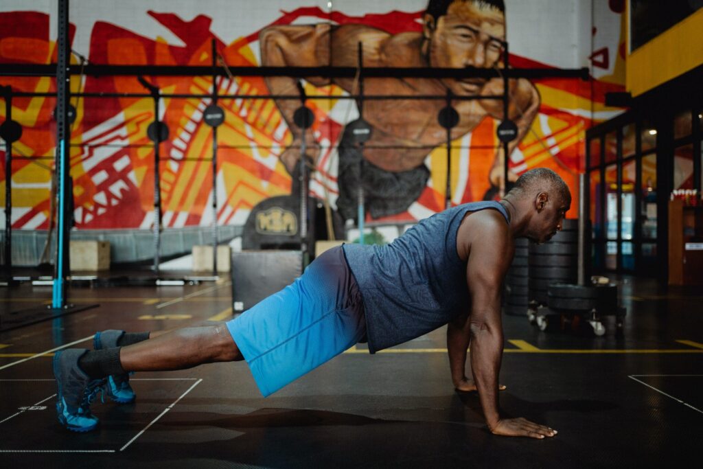 athlete performs perfect chest push-up workout at gym