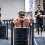 Hunter McIntyre pushes sled