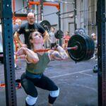 Bethany Shadburne performs a heavy front squat