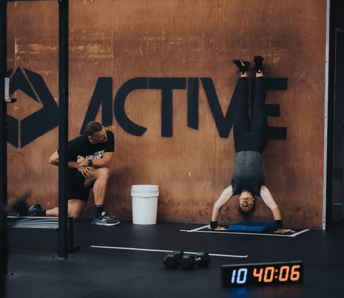 athlete does handstand push-ups during CrossFit quarterfinals