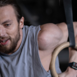 man with huge shoulders does best exercise for bigger front delts