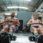 team athletes working out on rower Low Carb Meals
