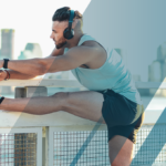 man performs warm up stretch before sport