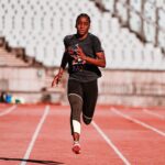 athlete runs hard during track workouts The Best Science Based Cardio Routine to Lose Fat Faster