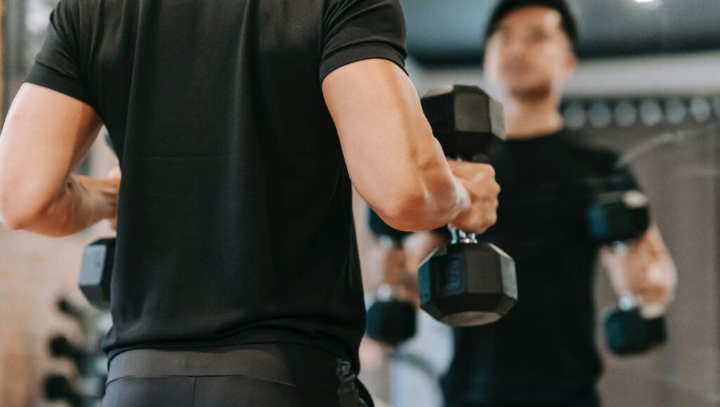 https://image.boxrox.com/2022/06/Dumbbells-on-a-mirror-1024x580.jpg