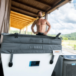 rich froning stands behind cold plunge recovery tool