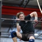 athlete struggles with bar muscle up but gives it full effort