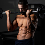 man doing a barbel bicep curl in gym