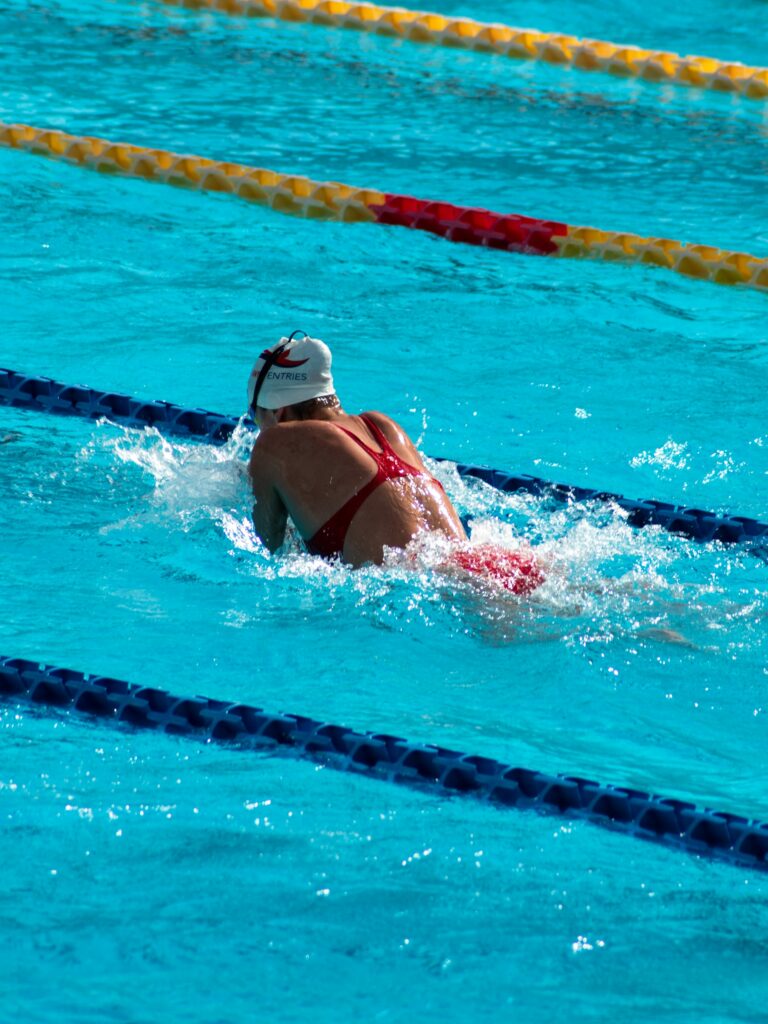 Woman swimming breaststroke.